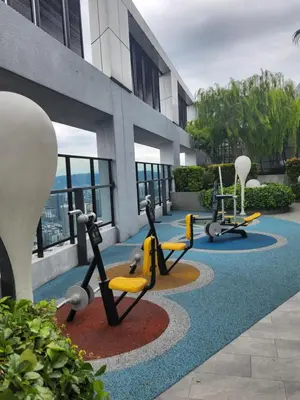 a row of exercise equipment on the side of a building at TRION Grand Service Suites at KL in Kuala Lumpur