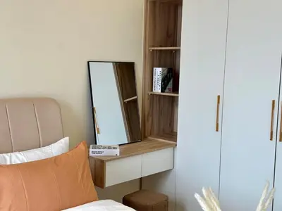 a mirror sitting on a shelf next to a bed at 9 Pax 3R3B Trion KL City View 10Mins to KLCC in Kuala Lumpur