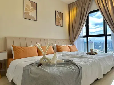 a bedroom with a bed with two stuffed animals on it at 9 Pax 3R3B Trion KL City View 10Mins to KLCC in Kuala Lumpur
