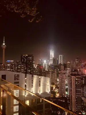 a view of a city skyline at night at The Robertson Residence Kuala Lumpur with City views in Kuala Lumpur