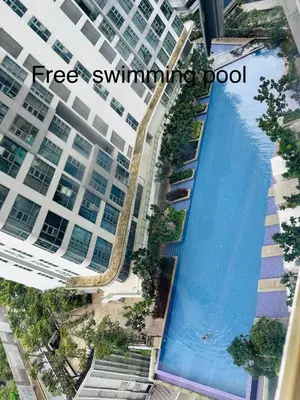 an overhead view of a swimming pool in a building at The Robertson Residence Kuala Lumpur with City views in Kuala Lumpur