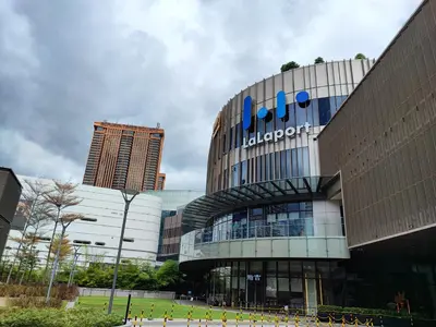 a building with a sign on the side of it at Lucentia Residences in Kuala Lumpur