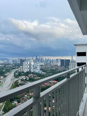 a view of a city from the balcony of a building at RumaDuke Kuala Lumpur with Netflix and KLCC Views in Kuala Lumpur