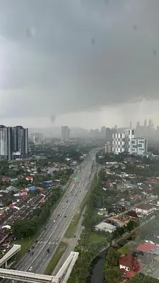 an aerial view of a city with a highway at RumaDuke Kuala Lumpur with Netflix and KLCC Views in Kuala Lumpur
