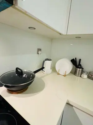 a frying pan on a counter in a kitchen at URBAN COMFY HOME at SkySuites Near KLCC Complimentary Breakfast in Kuala Lumpur