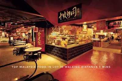 a restaurant with tables and chairs in a building at Dorsett Residence Kuala Lumpur #21 in Kuala Lumpur