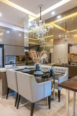 a dining room with a table and chairs at Dorsett Residence Kuala Lumpur #21 in Kuala Lumpur