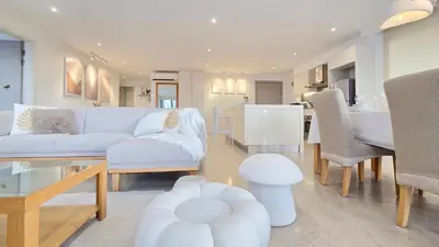 a living room with a couch and a table at Skyview Bukit Bintang Fairlane Residence #24 in Kuala Lumpur
