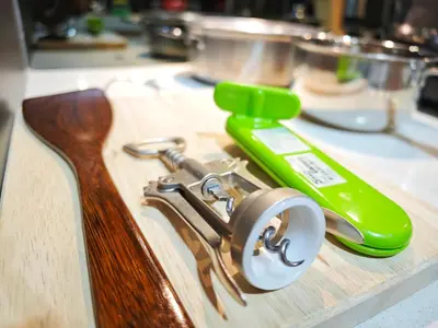 a pair of tongs sitting on top of a kitchen counter at Bintang Fairlane Residence #83 KLCC Pavilion in Kuala Lumpur