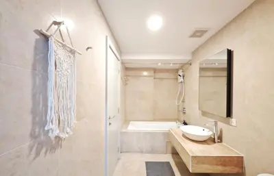 a bathroom with a shower and a sink and a tub at Bintang Fairlane Residence #83 KLCC Pavilion in Kuala Lumpur