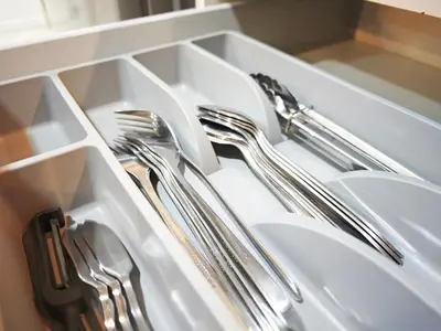 a sink with utensils in a white sink at Bintang Fairlane Residence #83 KLCC Pavilion in Kuala Lumpur