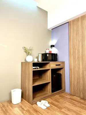 a kitchen with a microwave and a coffee maker at The Teak - Bangsar Trade Centre in Kuala Lumpur