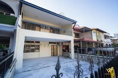 a building with a gate in front of it at Gather & Stay 5BR Cozy Home near Setapak & Wangsa Maju in Kuala Lumpur