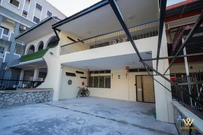 a view of the outside of a house with a garage at Gather & Stay 5BR Cozy Home near Setapak & Wangsa Maju in Kuala Lumpur