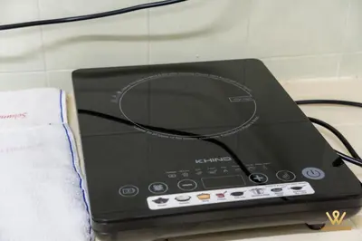 a black appliance sitting on top of a counter at Gather & Stay 5BR Cozy Home near Setapak & Wangsa Maju in Kuala Lumpur