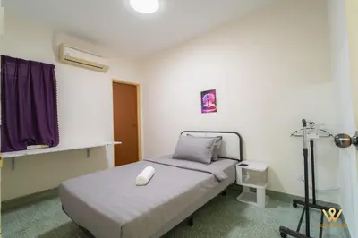 a hospital room with two beds and a window at Gather & Stay 5BR Cozy Home near Setapak & Wangsa Maju in Kuala Lumpur