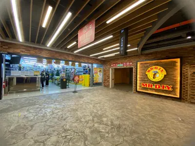 a shopping mall with a mr dry sign on the wall at Arcoris Mont Kiara FaceHome in Kuala Lumpur