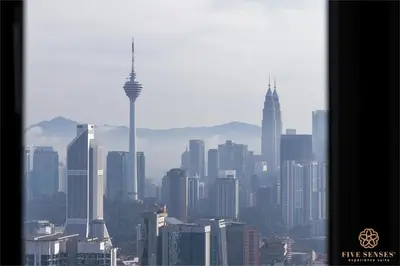 a view of a city skyline with the space needle at Riveria Signature Suites, KL Sentral in Kuala Lumpur