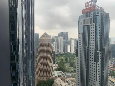 a view of a city skyline with tall buildings at Star Residence 1R1B KLCC in Kuala Lumpur
