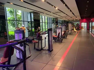 a large building with a gym with people exercising at Star Residence 1R1B KLCC in Kuala Lumpur