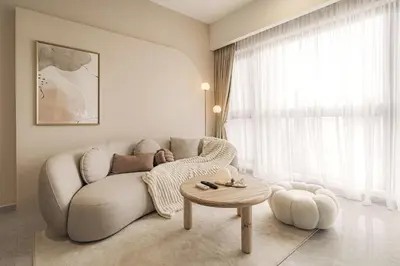 a living room with a couch and a table at Agile Bukit Bintang in Kuala Lumpur