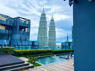 a view of the petronas twin skyscrapers at Star Suites KLCC by flixses in Kuala Lumpur