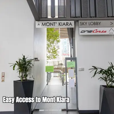 an entrance to a building with signs on the door at The Signature Residence at Sri Hartamas - 2 pax in Kuala Lumpur