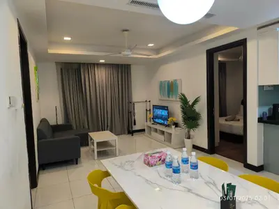a living room with a dining table and a living room at 0111 Sweet Home-Casa Residency 2R 2B City View in Kuala Lumpur