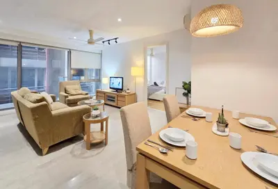 a living room with a dining table and a living room at Kuala Lumpur Bintang Fairlane #157 TRX in Kuala Lumpur