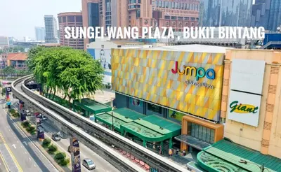 a building in a city with a train station at Dorsett Residence Kuala Lumpur #08 TRX KLCC Pavilion in Kuala Lumpur