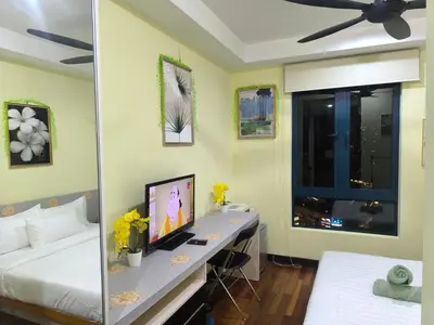 a bedroom with a desk and a bed and a window at 0267 Sweet Home-Casa Residency 1R 1B in Kuala Lumpur