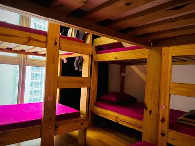 a couple of bunk beds in a room at Regalia Skypool KLCC Friendly Hostel in Kuala Lumpur