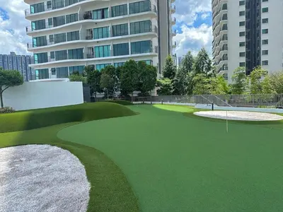 a golf course in the middle of a city at KLCC View Datum Jelatek Escape by Filux Holiday in Kampong Datok Keramat