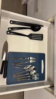 a drawer full of utensils in a kitchen at The Establishment Bangsar #19 by Ouki in Kuala Lumpur