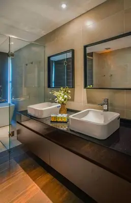 a bathroom with a large sink and a mirror at Novo Ampang, Luxury Premium 3BR Penthouse, Kuala Lumpur by Cobnb in Kuala Lumpur