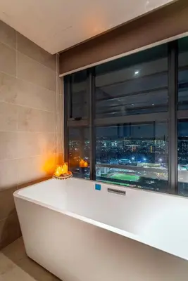 a room with a large window with a city view at Novo Ampang, Luxury Premium 3BR Penthouse, Kuala Lumpur by Cobnb in Kuala Lumpur
