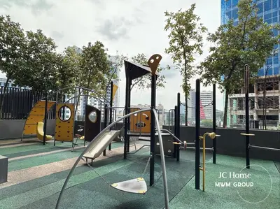 a playground with a slide in a city at The Anggun l 5-star Bathtub Suites By MWM in Kuala Lumpur