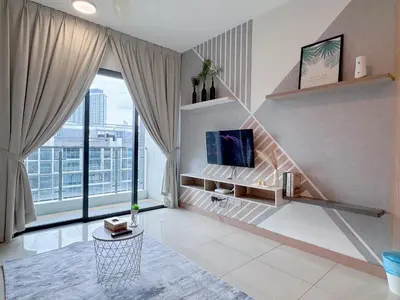 a living room with a tv and a large window at KL V Residence I with Balcony I 吉隆坡双威伟乐城民宿-附有阳台 I Walking distance to MRT & Mall & Nanjing Street I 马中英服务 I Malay English Chinese in Kuala Lumpur