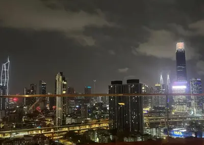 a view of a city at night with at Sunway Velocity in Kuala Lumpur