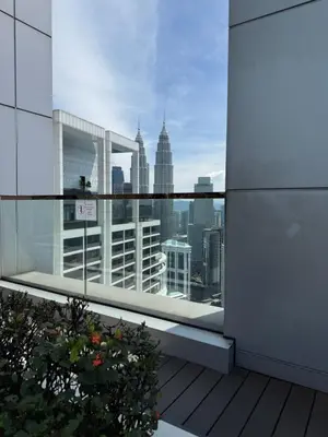a view of a city skyline from a balcony at The Platinum Kuala Lumpur by Skyscraper in Kuala Lumpur