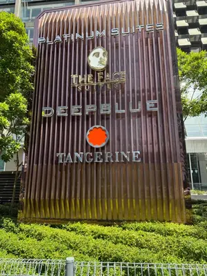 a building with a clock on the side of it at The Platinum Kuala Lumpur by Skyscraper in Kuala Lumpur