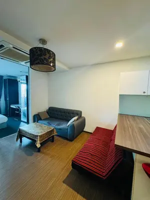 a living room with a couch and a table at Residence HomeStay in Kuala Lumpur