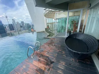 a swimming pool on the roof of a building at Kuala Lumpur Infinity Skypool hostel in Kuala Lumpur