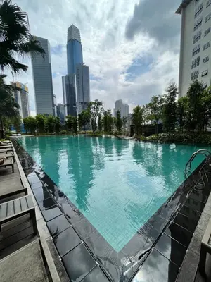 a large swimming pool in the middle of a city at Residensi Agile Delima by Times 8 in Kuala Lumpur
