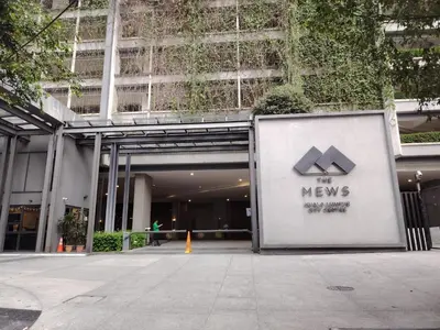 a building with a sign that reads the new arrows at The MEWS KLCC By Arman in Kuala Lumpur