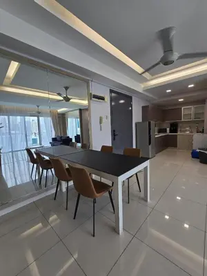 a dining room table and chairs in a room at KLCC SOGO new 2R2B LRT PWTC Sunway Putra Sky Pool in Kuala Lumpur