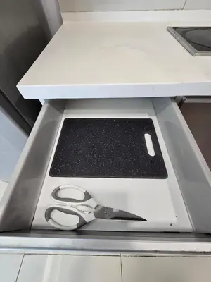 a pair of scissors sitting in a drawer at KLCC SOGO new 2R2B LRT PWTC Sunway Putra Sky Pool in Kuala Lumpur