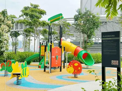 a playground with a slide in a park at Luxury Homestay KL Center 6-8pax TRX-Velocity-Ikea in Kuala Lumpur