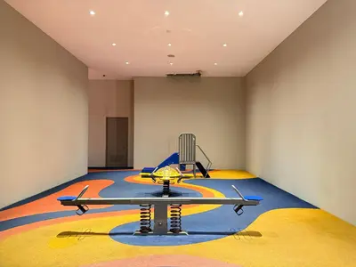 a room with a table and a chair in it at Eaton Residences KLCC By ARBAN in Kuala Lumpur