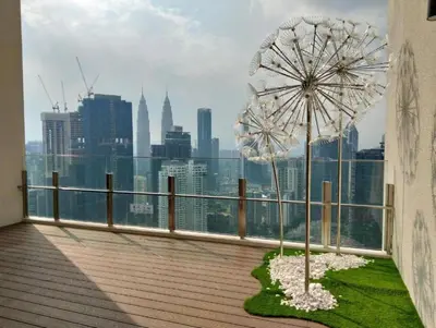 a view of a city skyline from a balcony at Agile Residence Service Suites Bukit Bintang KL in Kuala Lumpur